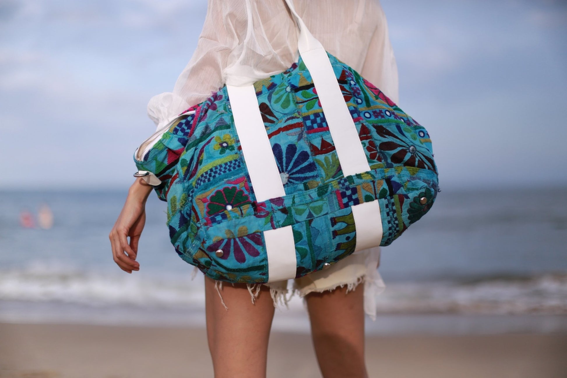 EMBROIDERED PATCHWORK DUFFLE WEEKENDER MOMO NEW YORK