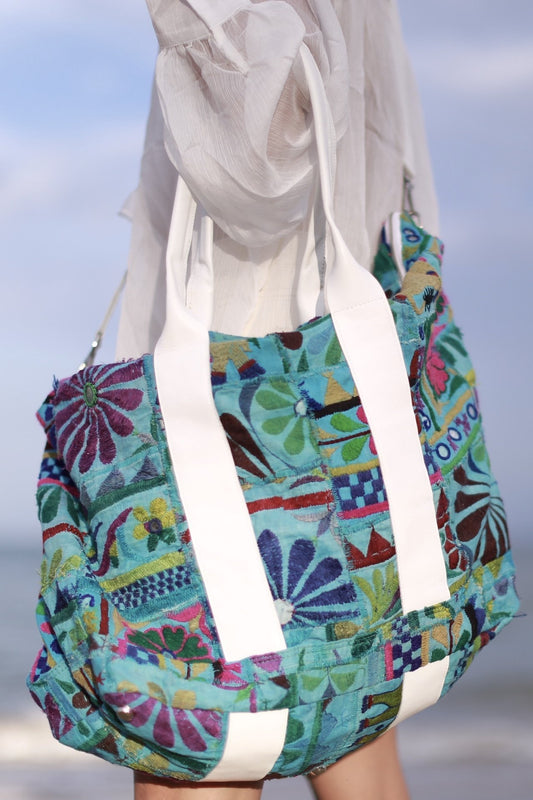 EMBROIDERED PATCHWORK DUFFLE WEEKENDER MOMO NEW YORK